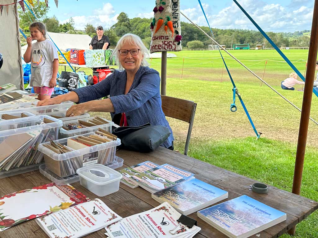 A photo of the Bream Gardeners Stall with books and seeds