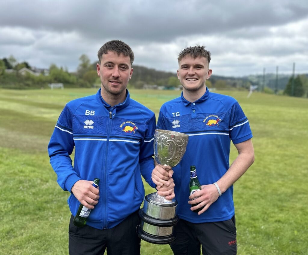 A photo of Billy Biddle and Tom Grange with the trophy