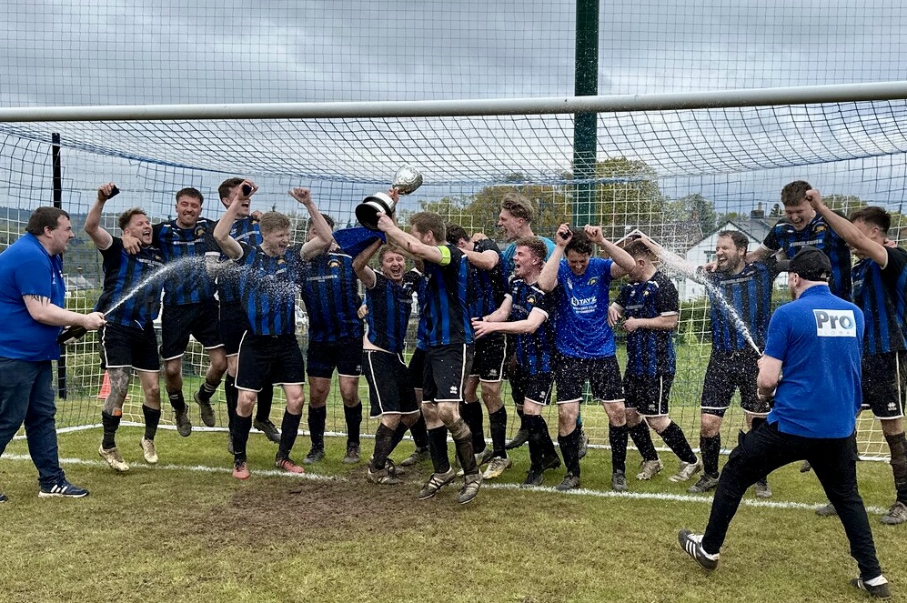 A photo of the players celebrating.