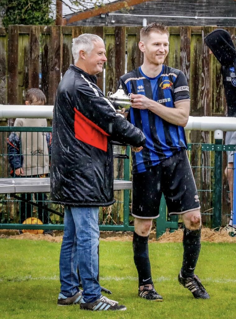 The captain receives the cup